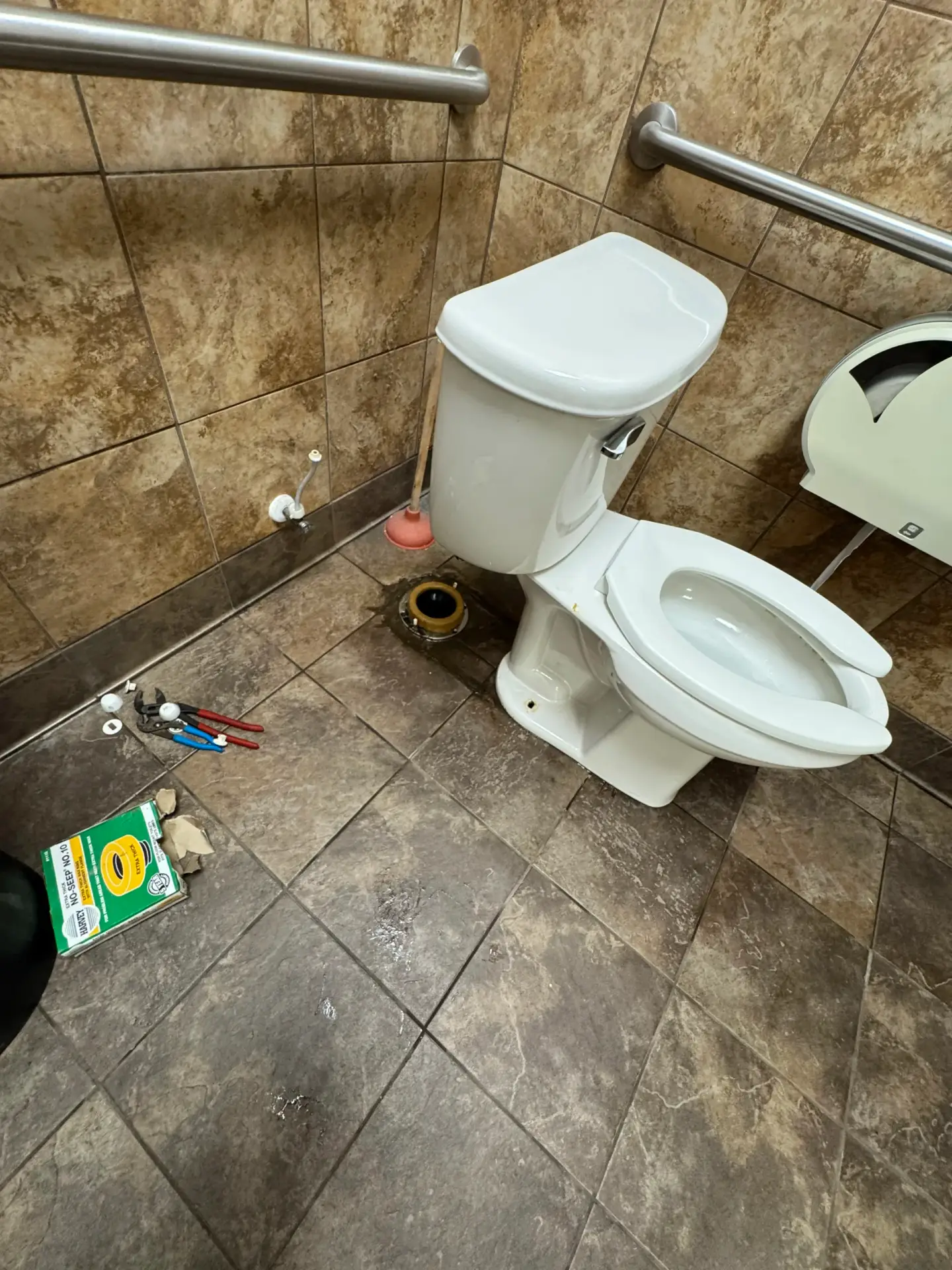 Newly installed toilet in a commercial bathroom
